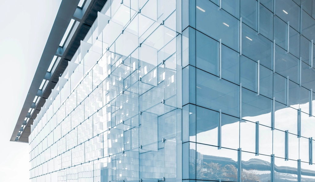 Modern business district representing influence beyond ownership and investment.