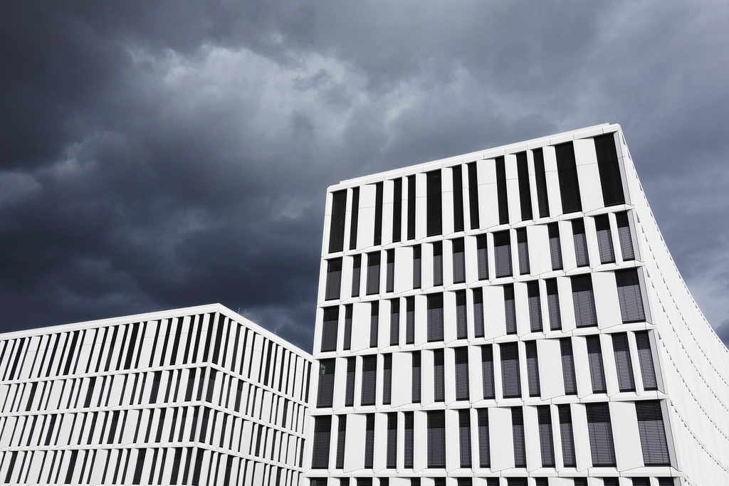 Commercial real estate district representing long-term business influence.